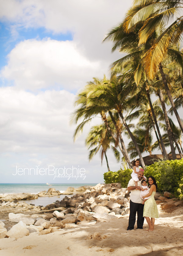 hawaii family photography at aulani disney by the beach pictures with palmtrees