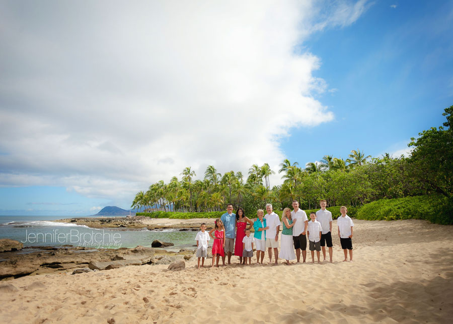 photographer family photos on the beach at disney aulani at koolina